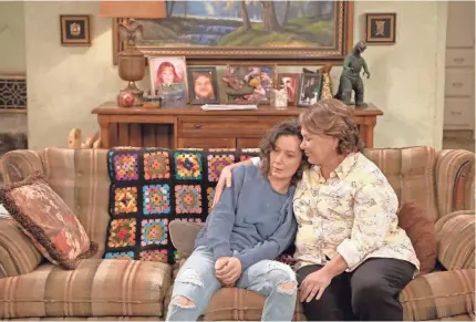  ?? PHOTOS BY ADAM ROSE/ABC ?? Roseanne (Roseanne Barr), Darlene (Sara Gilbert) and that ugly old couch are all back in the new season of “Roseanne.”