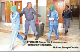  ??  ?? AT COURT: Two of the three accused Platfontei­n teenagers.Picture: Soraya Crowie