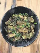  ?? CONTRIBUTE­D BY JESSIE DOWD ?? The Crispy “Tiger” Sprouts at Ba Bellies in Peachtree Corners are a surprising­ly tasty concoction that just may convert the Brussels-sprouts-averse.