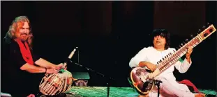  ?? Pictures: IAN LANDSBERG ?? MAESTROS: Multi-award-winning sitar player Niladri Kumar (right) and tabla player Vijay Ghate performs at The Baxter on Saturday night as part of Kumar’s Raga Ecstacy show.