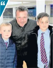  ??  ?? Now is too soon Gordon McGovern with sons Ronan, 9, left, and Finn, 11, right