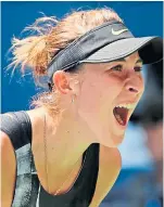  ??  ?? Belinda Bencic celebrates.