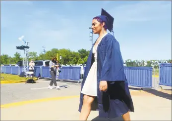  ?? Cassandra Day / Hearst Connecticu­t Media ?? The Middletown High School Class of 2020 graduated 347 members on Tuesday. The graduation rate for the 2018-20 academic year was 97 percent — a full 11 points above the state average.