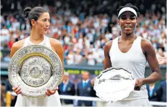  ??  ?? Serial winner: Garbine Muguruza went straight back on to the circuit after taking the Wimbledon title in July (left) and was rewarded with a hard-court tournament victory in Cincinnati a fortnight ago