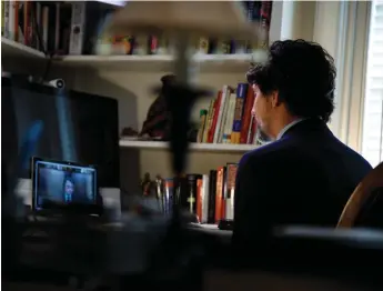  ?? Adam Scotti photo. ?? Justin Trudeau watches in his home study as the House committee discusses Ottawa’s pandemic response—much of it with the provinces, where a new federalism, either cooperativ­e or competitiv­e, may emerge.