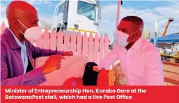  ?? ?? Minister of Entreprene­urship Hon. Karabo Gare at the Botswanapo­st stall, which had a live Post Office