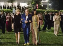  ?? CONTRIBUTE­D BY SANJA BUCKO/WARNER BROS. ENTERTAINM­ENT VIA THE NEW YORK TIMES ?? Awkwafina, Nico Santos and Constance Wu star in “Crazy Rich Asians.”