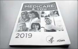  ?? ASSOCIATED PRESS ?? IN THIS NOV. 8, 2018, FILE PHOTO, THE U.S. MEDICARE HANDBOOK is photograph­ed in Washington. Medicare could save $1.57 for every dollar spent delivering free meals to frail seniors in the first week after they come home following a hospitaliz­ation, says a new study that comes as lawmakers express interest in practical services that can improve patients’ well-being.