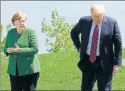  ?? REUTERS ?? Angela Merkel and Donald Trump at the G7 summit.