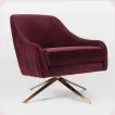  ?? [PHOTO
BY WEST ELM/AP] ?? Roar & Rabbit’s sexy, sophistica­ted swivel chair, which evokes classic continenta­l midcentury styling. The lush berry hue is another 2017 trend, as jewel tones continue to ride a wave of popularity started last fall.