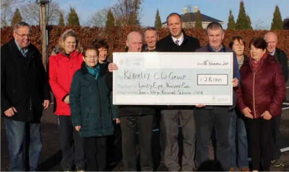  ??  ?? Barry Eaton Louth County Council presents a cheque to the Kilkerley Community Developmen­t Group for funding received under the Town and Village Renewal Scheme 2018. The funding was for surfacing works to the carpark which was recently completed, which is adjacent to the playground which was completed under the Town and Village 2017 scheme.