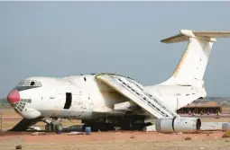  ?? KAMRAN JEBREILI/AP ?? An abandoned Ilyushin Il-76 jet linked to arms smuggler Viktor Bout lies partially dismantled Friday at the old airfield of Umm al-quwain, United Arab Emirates.