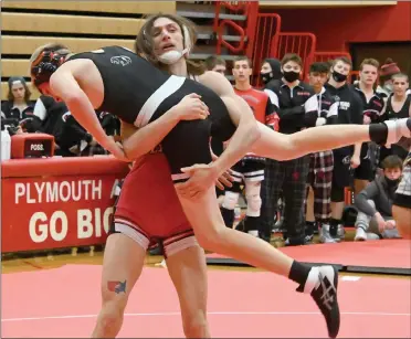  ?? PILOT PHOTO/MAGGIE NIXON ?? Plymouth senior Dominic Smith has control of his opponent picking up a pin, but Plymouth fell to Northwood on senior night.