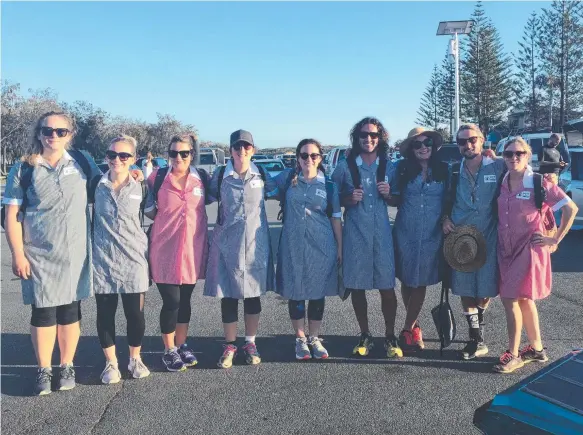  ??  ?? The Do It In A Dress team walked the length of the Gold Coast to raise awareness and much-needed funds to support girls in the African nation of Sierra Leone.