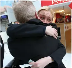  ??  ?? Tearful hug: For the new MP’s retired teacher father Alan