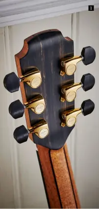  ??  ?? 1
1. Lowden-badged Gotoh 510 tuners sit three-a-side on the FMc’s headstock atop a five-piece mahogany/ rosewood neck