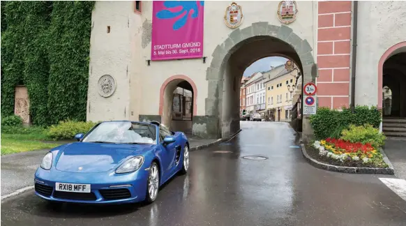  ??  ?? Boxster poses in front of the distinctiv­e arched entrance to Gmünd’s centre