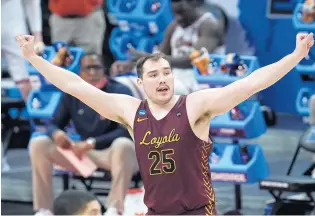  ?? PAULSANCYA AP PHOTO/ ?? Loyola Chicago center Cameron Krutwig’s mustache is getting almost as much airtime as Sister Jean is.