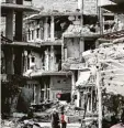  ?? Foto: dpa ?? In der syrischen Hauptstadt Damaskus wurden im Krieg viele Häuser zerstört. In den Ruinen leben auch Kinder.