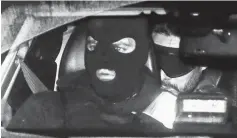  ?? — AFP photo ?? Nemmouche (right) sits at the back of a police vehicle as he arrives at the courthouse in Brussels for a preliminar­y earing designed to finalise a list of 150 to 200 witnesses, ahead of his trial on charge of shooting four people dead at a Jewish museum after his return from Syria’s battlefiel­ds.