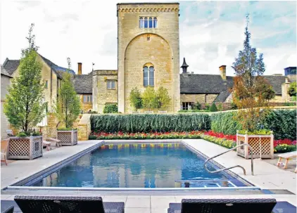  ??  ?? Fancy a dip? Ellenborou­gh Park near Cheltenham is a 15th-century manor house with an outdoor pool