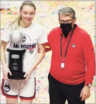  ?? David Butler II / USA TODAY ?? UConn’s Paige Bueckers, the Big East tournament’s Most Outstandin­g Player, and coach Geno Auriemma are expected to get a No. 1 seed in the upcoming NCAA tournament.