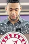  ?? VASHA HUNT/AP ?? Alabama quarterbac­k Tua Tagovailoa announces his intentions to declare for the 2020 NFL draft on Monday in Tuscaloosa, Ala.