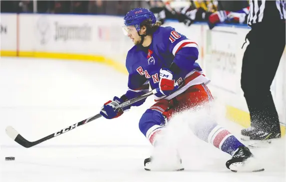  ?? EMILEE CHINN/GETTY IMAGES FILES ?? The MVP stock of centre Artemi Panarin, who tied for third in regular-season scoring with 95 points, has risen now that the Rangers are a playoff team.