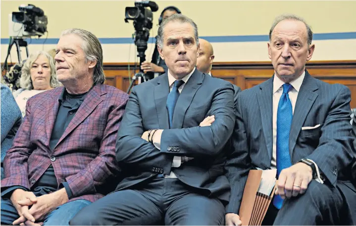  ?? ?? Hunter Biden, centre, with his attorney Abbe Lowell, right, at the House Oversight Committee hearing