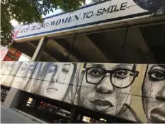  ??  ?? ‘Stop Telling Women to Smile’ by Tatyana Fazlalizad­eh, mural in Chicago, Illinois