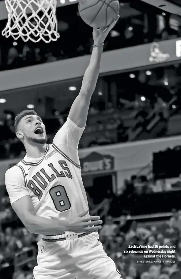  ?? STREETER LECKA/GETTY IMAGES ?? Zach LaVine had 16 points and six rebounds on Wednesday night against the Hornets.