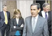  ?? JAY JANNER / AMERICAN-STATESMAN 2013 ?? Abigail Fisher and supporter Edward Blum (center right) depart after a hearing in her case in 2013. Fisher sued in 2008 after her applicatio­n for UT admission was rejected.