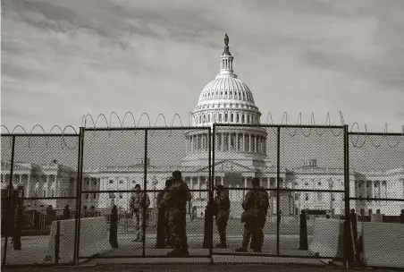  ?? New York Times file photo ?? A security fence around the U.S. Capitol is shown Jan. 15, a little more than a week after rioters stormed the building.