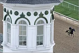  ?? CHARLIE RIEDEL / AP ?? Kentucky Derby entrant Simplifica­tion works out at Churchill Downs on Thursday in Louisville, Ky. The 148th running of the Kentucky Derby is scheduled for today.