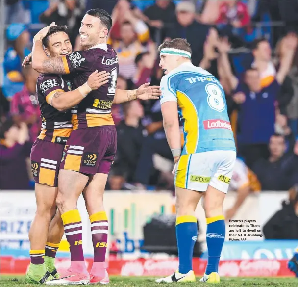  ?? Picture: AAP ?? Bronco's players celebrate as Titans are left to dwell on their 54-0 drubbing.