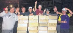  ?? SUBMITTED PHOTO ?? A group of participan­ts in the 2016 Michelle Curtis Memorial Washer Toss Tournament stand behind the pile of washer toss boxes at the end of the event.