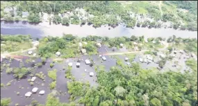  ??  ?? An Aerial view of Kwakwani, Region 10, showing areas of the community inundated with water (Photo courtesy of Learie Barclay)