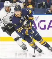  ?? Jeffrey T. Barnes Associated Press ?? BUFFALO’S Jack Eichel, who scored in the third period, skates ahead of the Kings’ Anze Kopitar.