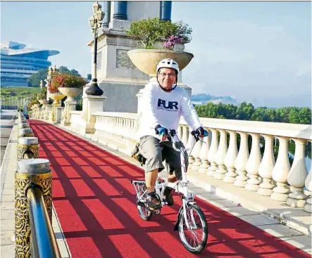  ?? — adib NOH ?? adib enjoying a day out on his cycle in Putrajaya.