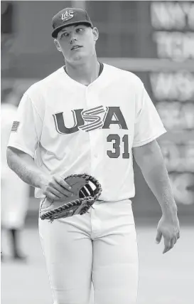  ?? Karen Warren / Houston Chronicle ?? Oak Ridge’s Luken Baker has caught the eyes of USA Baseball, playing for the American team against Canada at Minute Maid Park last year, and is in the process of impressing the pro scouts.