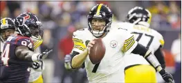  ?? MICHAEL WYKE — THE ASSOCIATED PRESS ?? Steelers’ quarterbac­k Ben Roethlisbe­rger has had a resurgence since his fiveinterc­eption nightmare in the first Jaguars game.