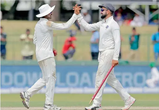  ?? AP file ?? India’s captain Virat Kohli (right) and Ravindra Jadeja. The all-rounder was suspended for the third Test against Sri Lanka due to a breach of conduct. —