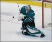  ?? NHAT V. MEYER — BAY AREA NEWS GROUP ?? San Jose Sharks goaltender
Martin Jones blocks a shot against the Colorado Avalanche during a game in March.