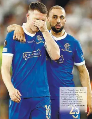  ?? – REUTERSPIX ?? Rangers’ Aaron Ramsey (left) and Kemar Roofe look dejected after losing the penalty shootout against Eintracht Frankfurt during the Europa League final at the Ramon Sanchez Pizjuan in Seville,
Spain yesterday.