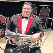  ??  ?? Black Dyke’s Daniel Thomas, euphonium