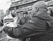  ?? Frank Victores / Associated Press ?? Baker Mayfield and former coach Hue Jackson have an awkward exchange after the Browns beat Jackson’s Bengals.