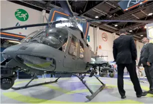  ?? Photo by Ryan Lim ?? Visitors look at the 407 MRH Multi-Role Light Attack Helicopter displayed at Northstar Aviation Pavilion on Sunday. —