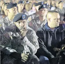  ?? Barbara Davidson Los Angeles Times ?? A CANDLELIGH­T VIGIL honored victims of the Ft. Hood shooting rampage the day after it happened in 2009. On Friday, 44 victims will receive medals.