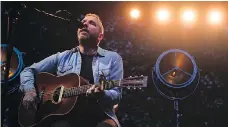  ?? KAYLE NEIS ?? Dallas Green of City and Colour delivered a crowd-pleasing acoustic performanc­e at the jazz festival, writes Heather Persson.