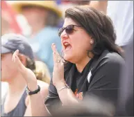  ?? Matthew Brown / Hearst Connecticu­t Media ?? Tricia Fabbri, Quinnipiac women’s basketball coach and the wife of Ridgefield’s baseball coach Paul Fabbri shows her support for her husband’s team during the Class LL baseball finals Saturday against Cheshire at Palmer Field Stadium in Middletown.